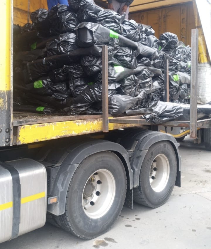 Truck loaded with black plastic sheeting for nationwide delivery – ESS Building Solutions